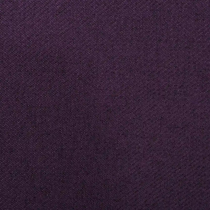 Purple Push Back Recliner with Copper Accents and Rolled Arms